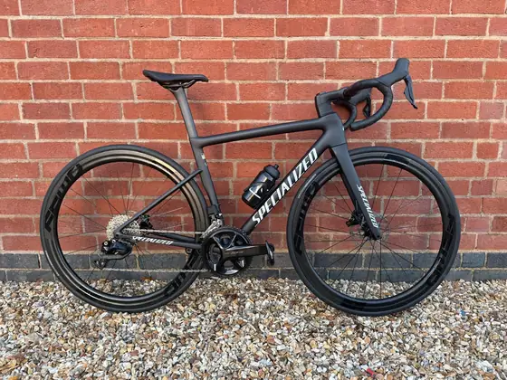 Matte black Specialized road bike with deep-section Roval wheels